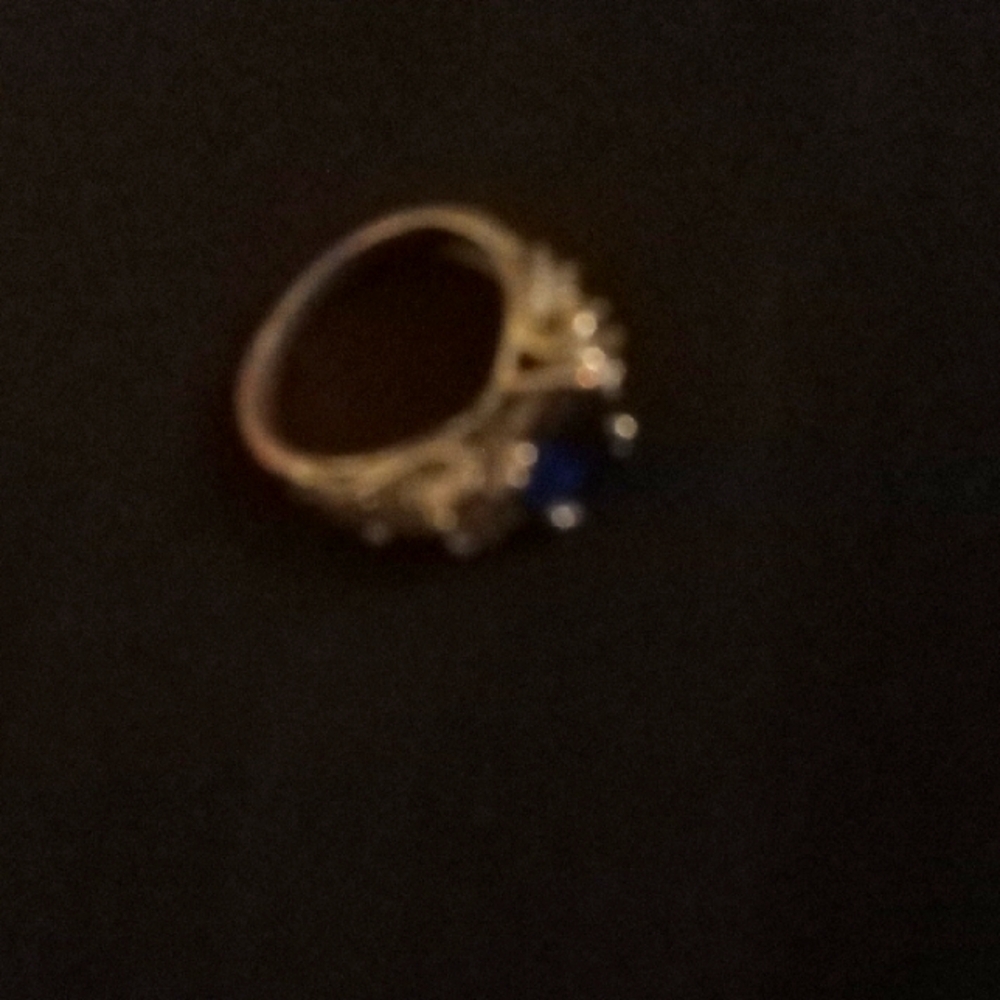 Elegant Gold Ring with Deep Blue Stone